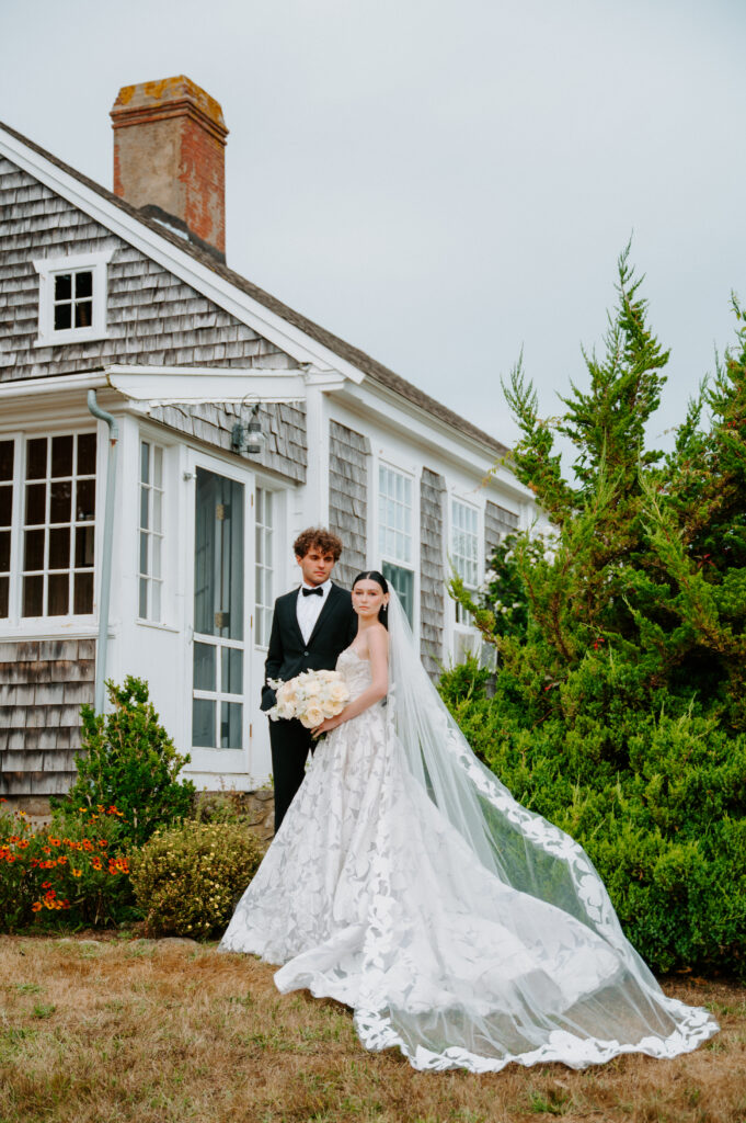 Bride in a flowing dress with groom at a Martha’s Vineyard wedding